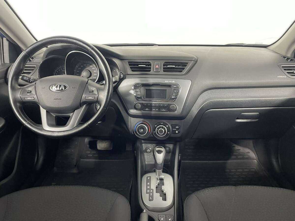 Kia Rio с пробегом — 2014 год. Фото: #6