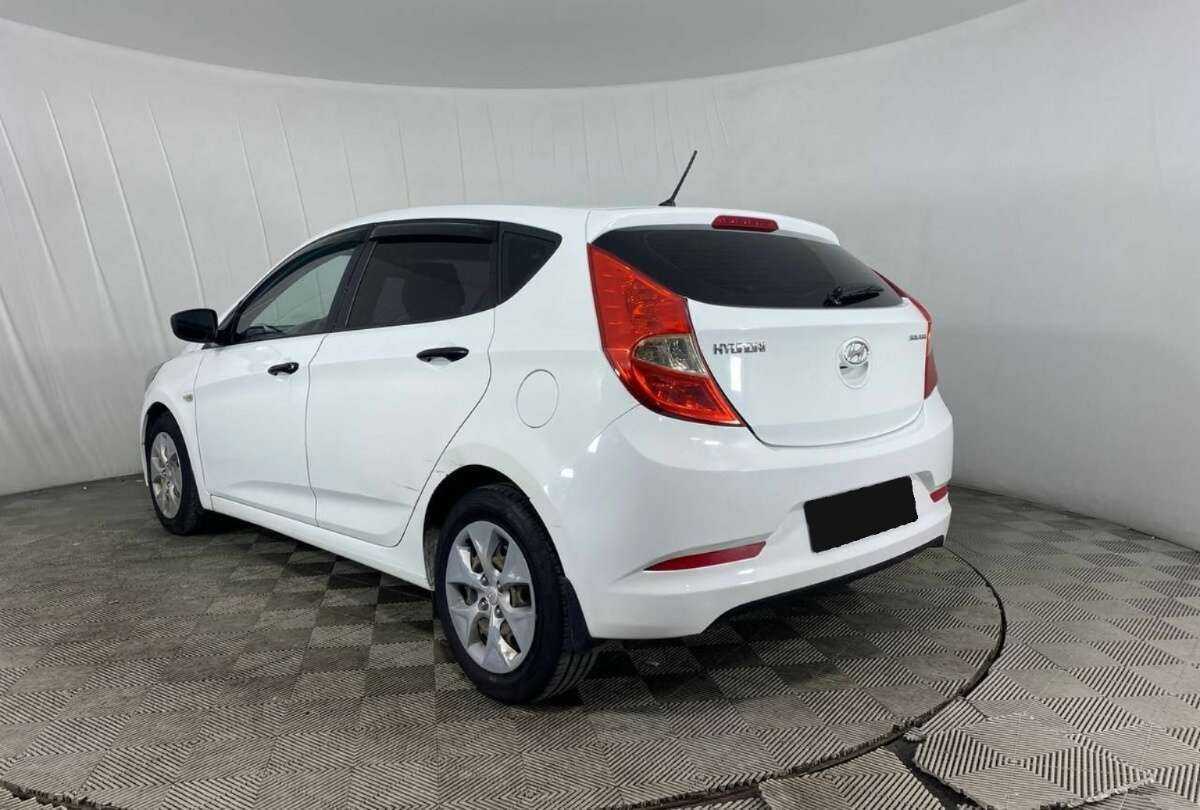 Hyundai Solaris с пробегом — 2014 год. Фото: #6