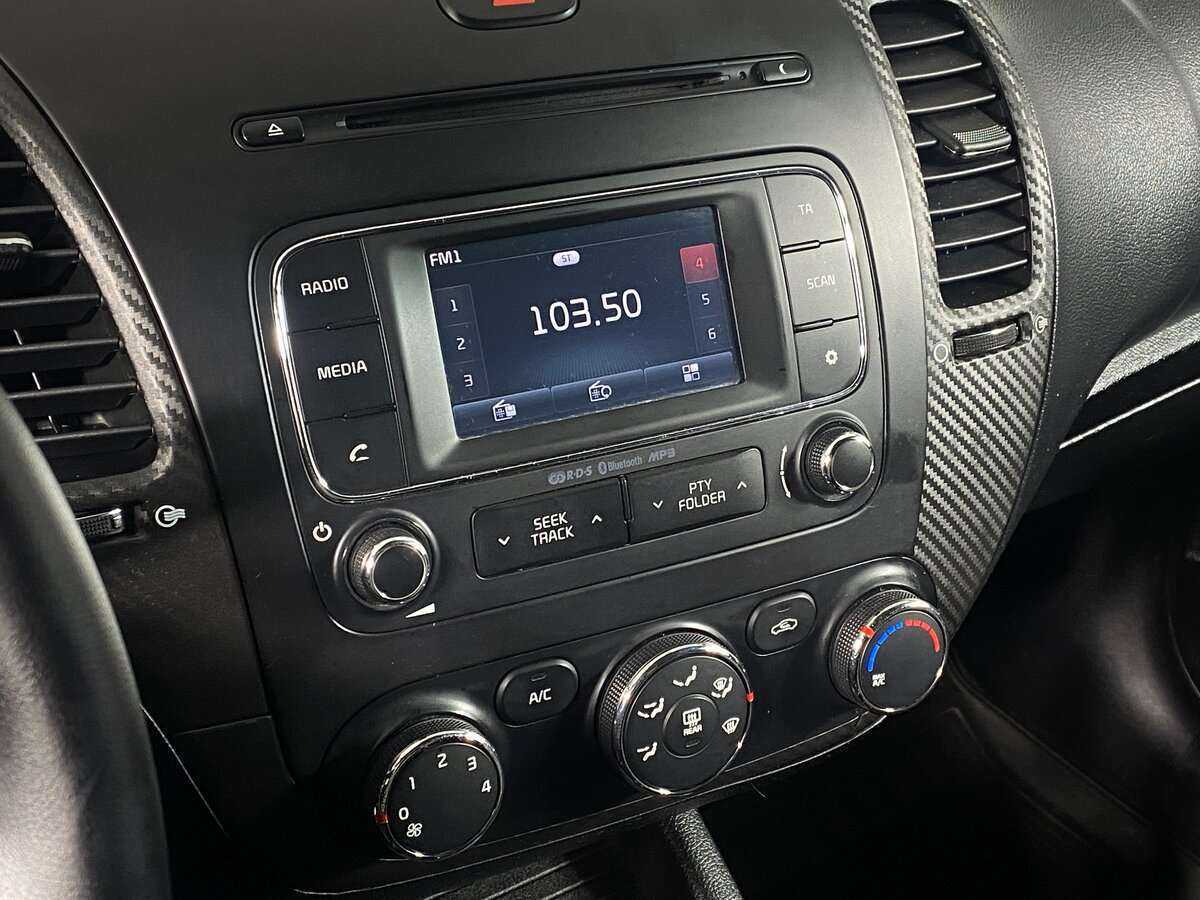 Kia Cerato с пробегом — 2013 год. Фото: #10