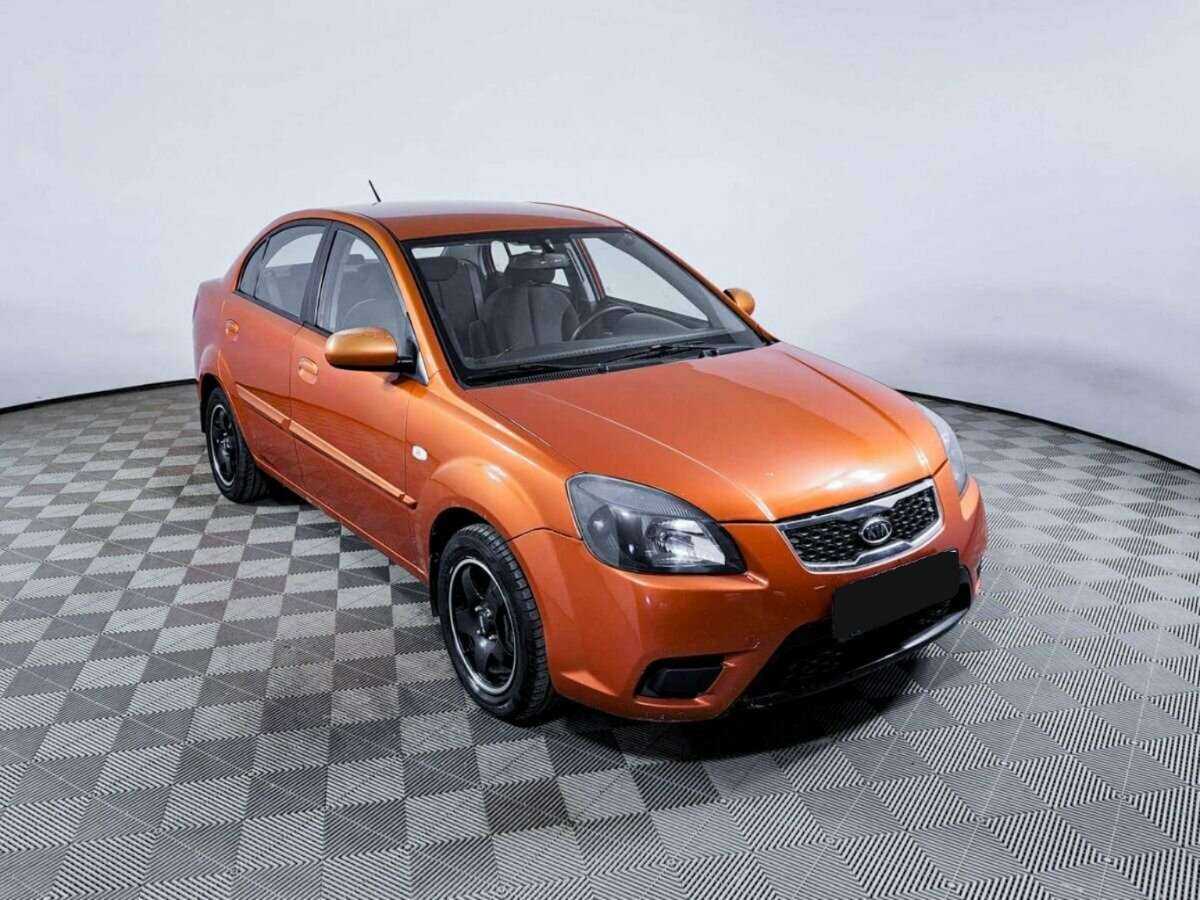 Kia Rio с пробегом — 2011 год. Фото: #2