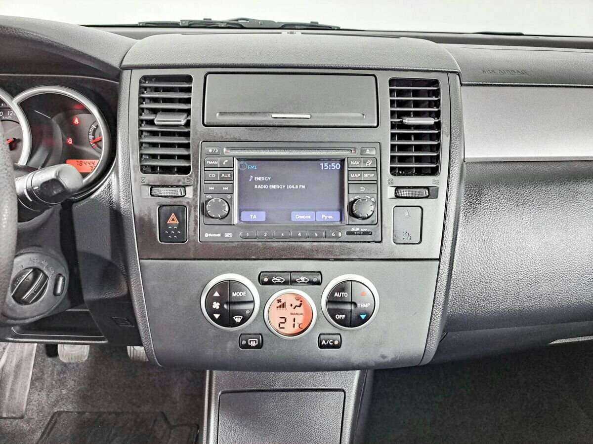 Nissan Tiida с пробегом — 2012 год. Фото: #12