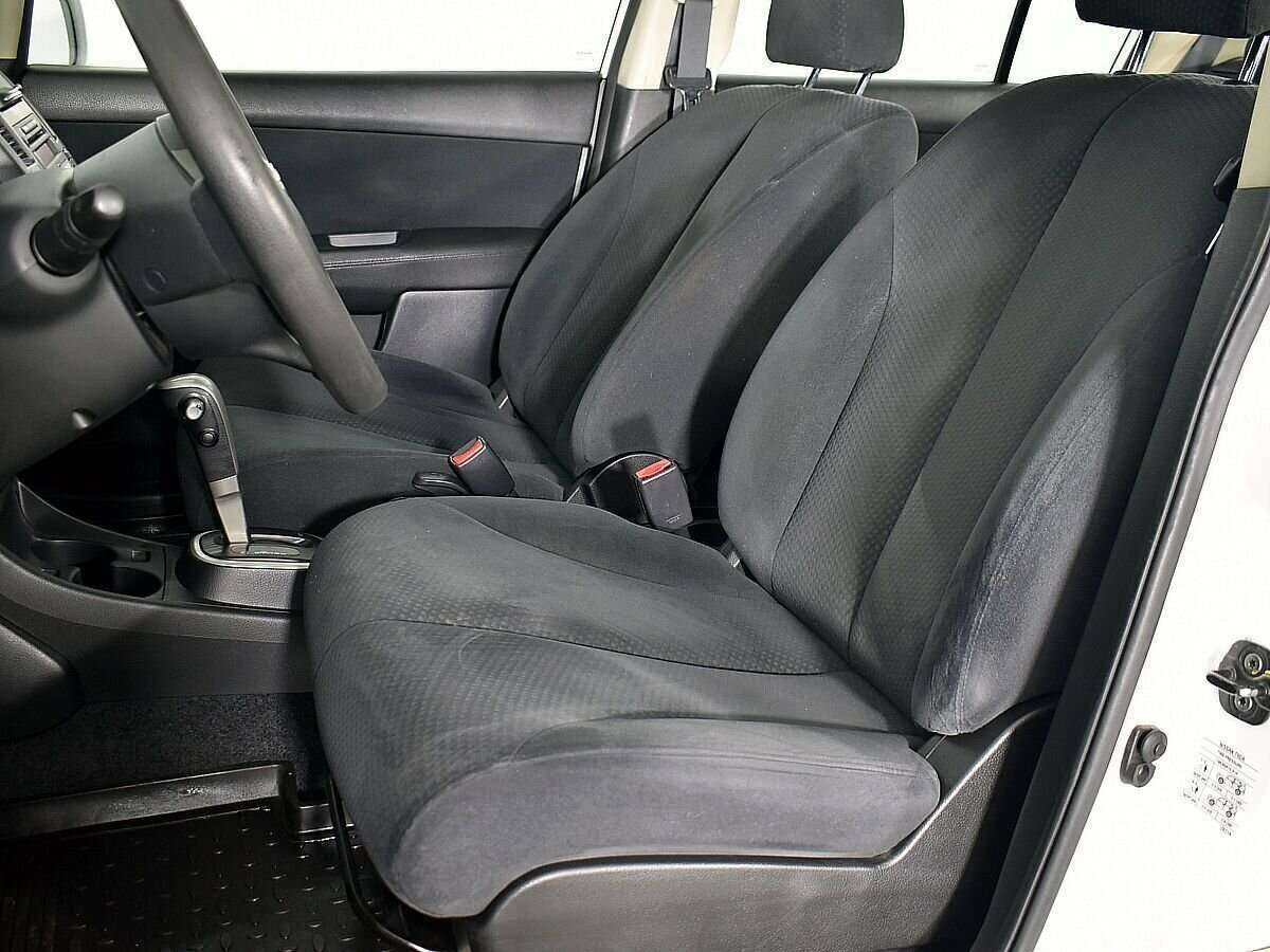 Nissan Tiida с пробегом — 2013 год. Фото: #7