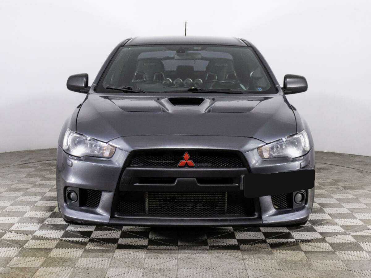 Mitsubishi Lancer Evolution с пробегом — 2011 год. Фото: #1