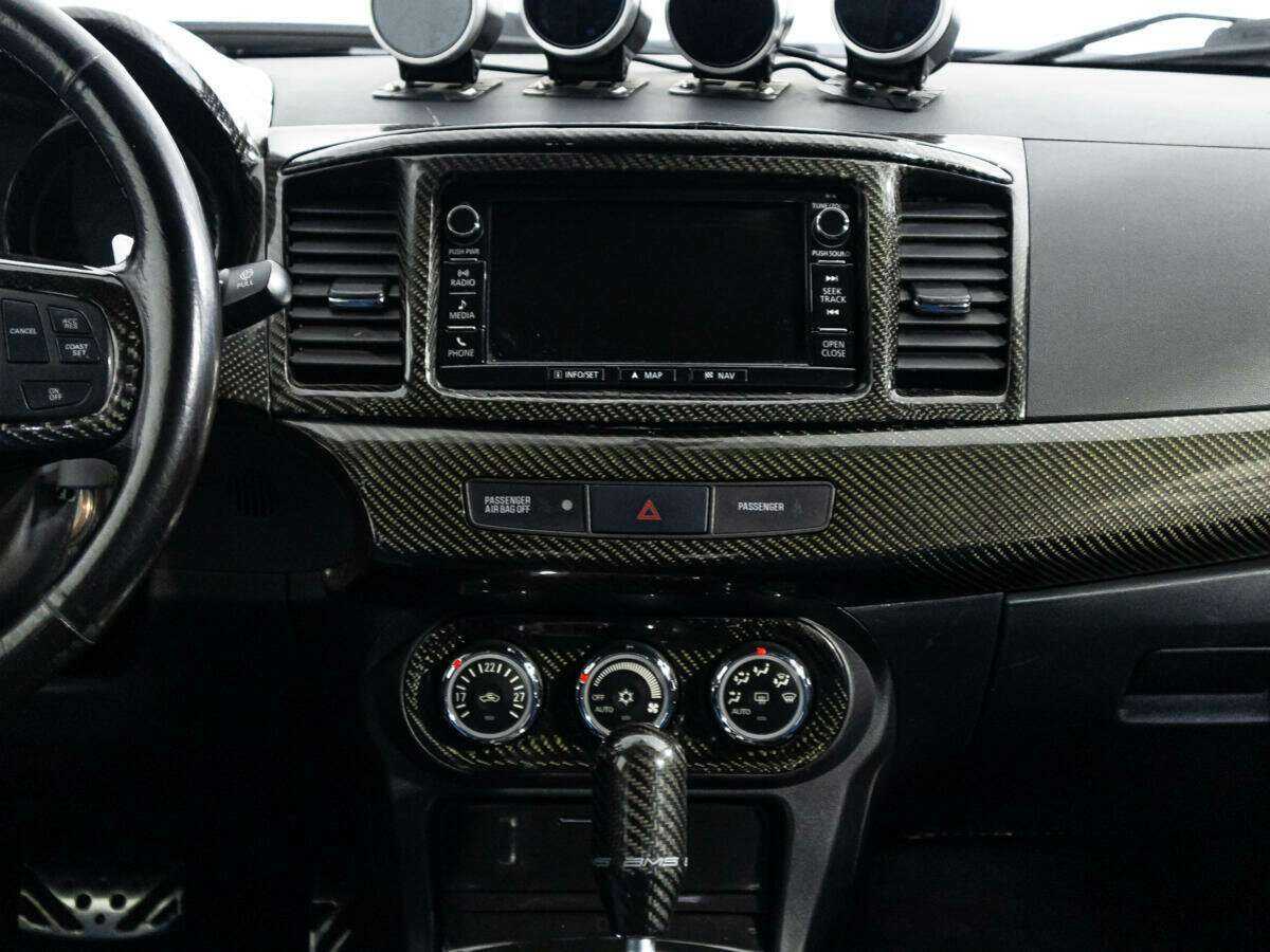 Mitsubishi Lancer Evolution с пробегом — 2011 год. Фото: #13