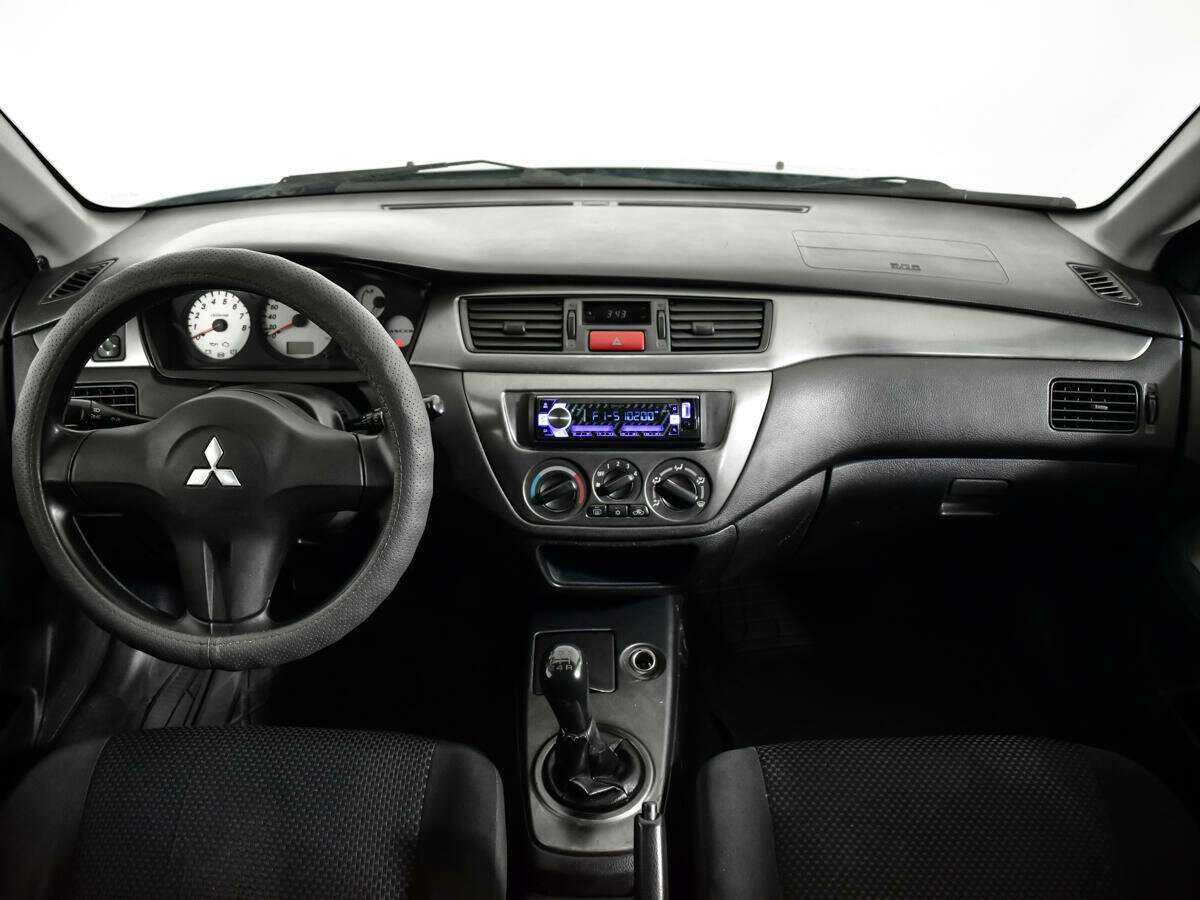 Mitsubishi Lancer с пробегом — 2006 год. Фото: #11