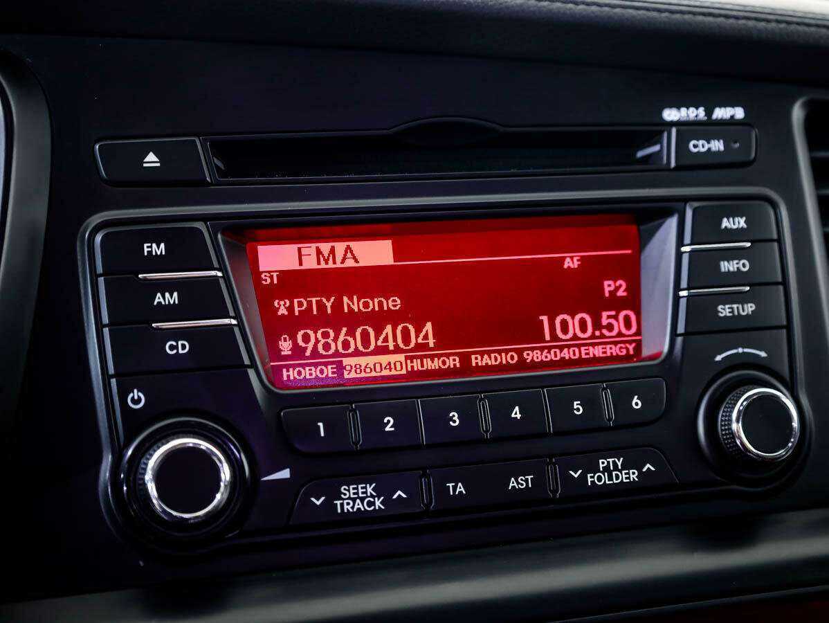 Kia Optima с пробегом — 2013 год. Фото: #13