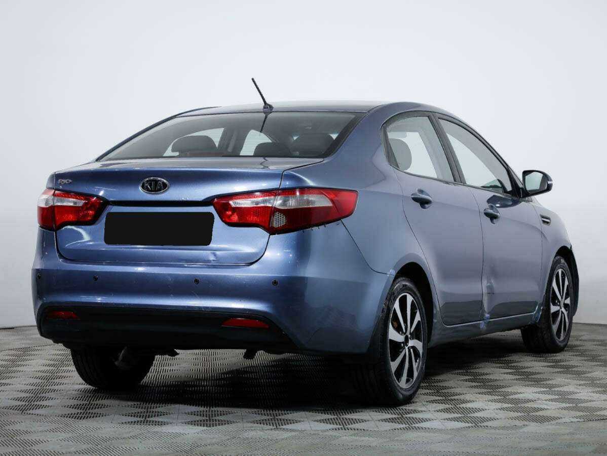 Kia Rio с пробегом — 2011 год. Фото: #2
