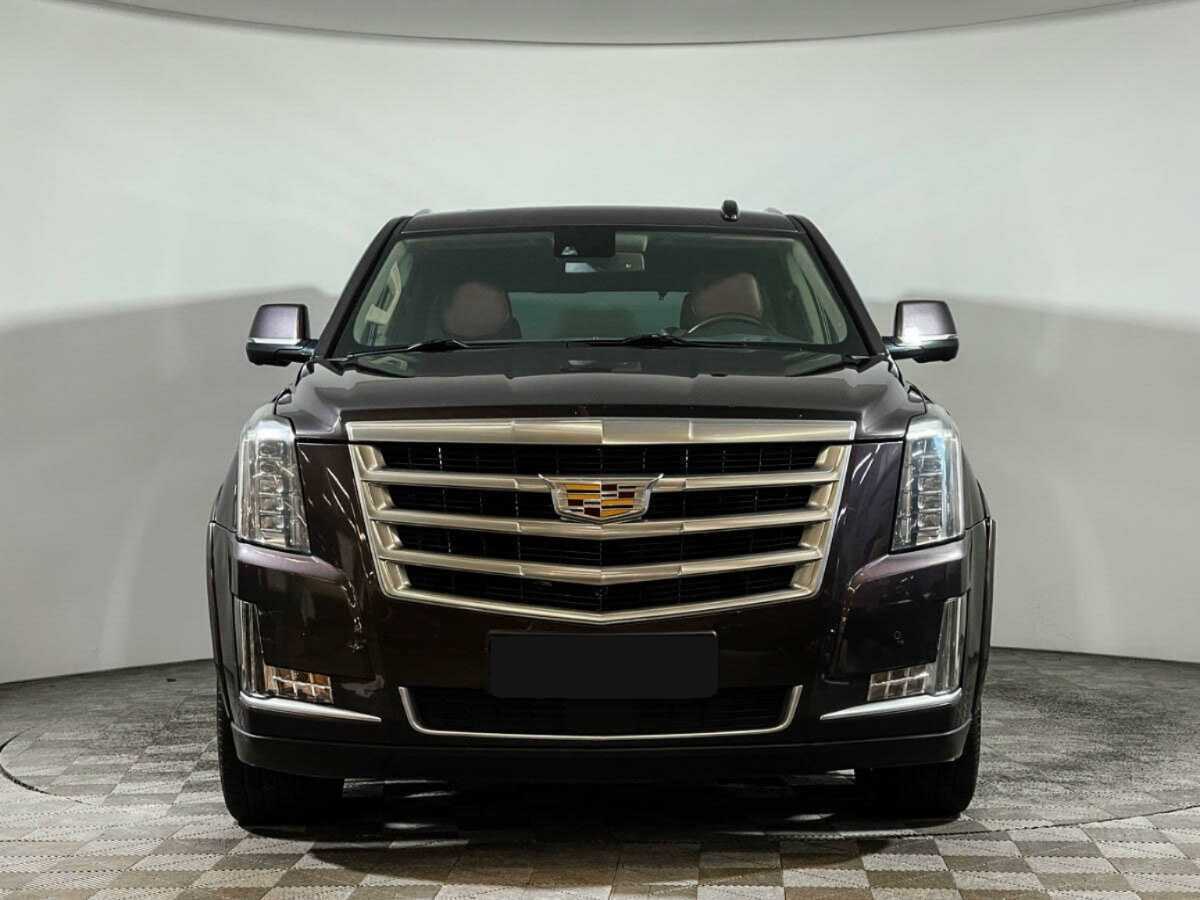 Cadillac Escalade с пробегом — 2016 год. Фото: #1