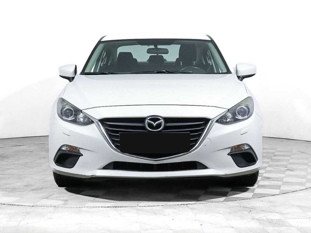 Mazda 3 с пробегом — 2014 год. Фото: #1