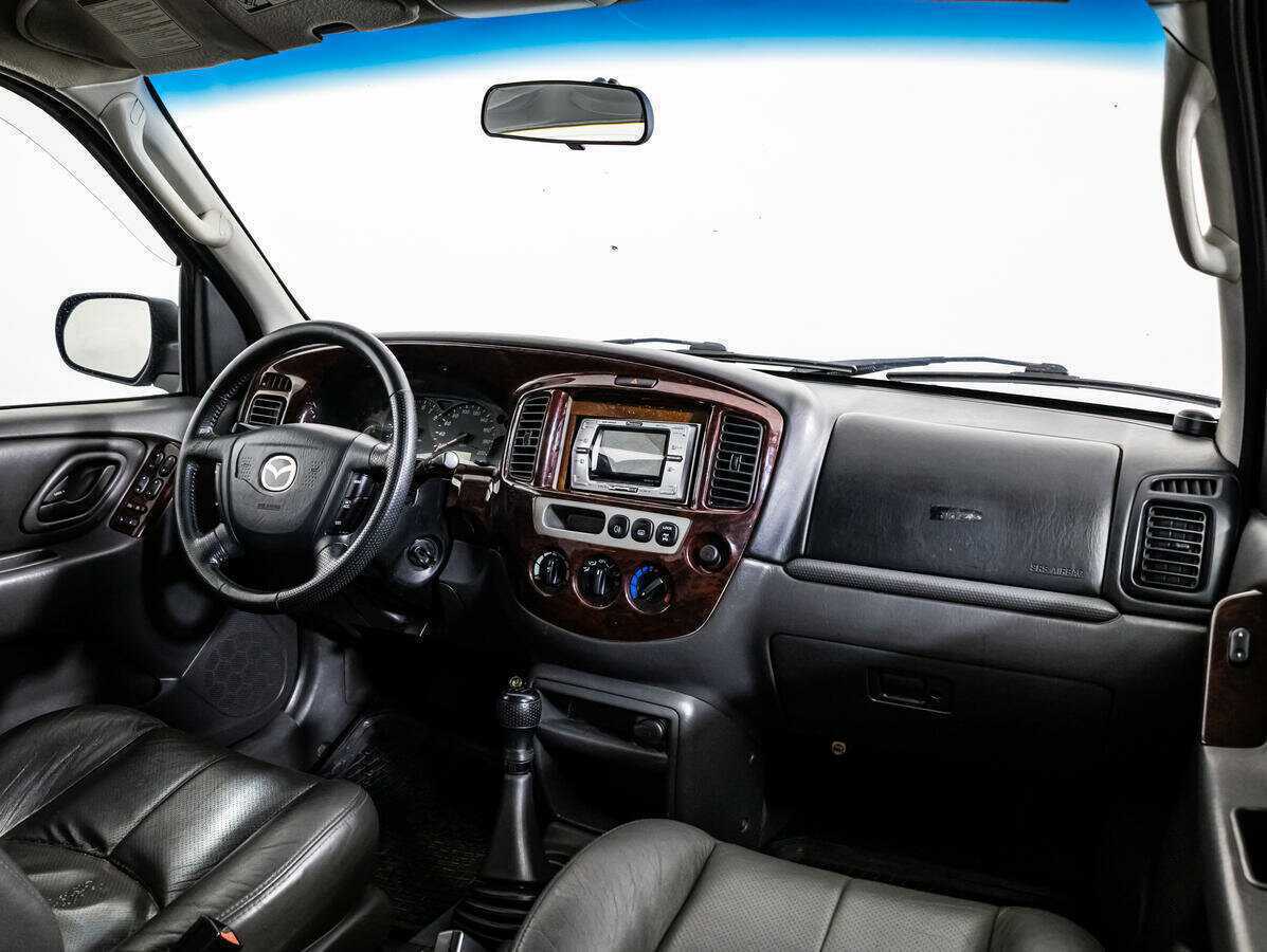 Mazda Tribute с пробегом — 2003 год. Фото: #6