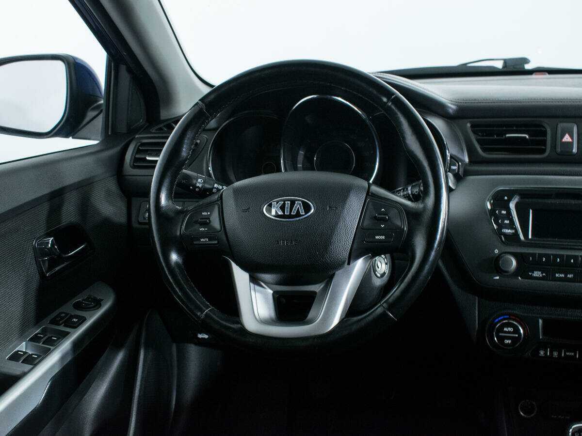 Kia Rio с пробегом — 2013 год. Фото: #13