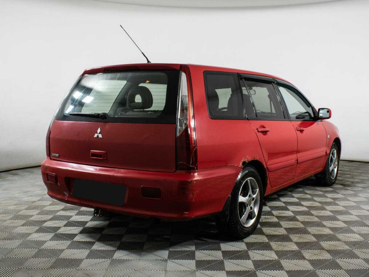 Mitsubishi Lancer с пробегом — 2005 год. Фото: #4