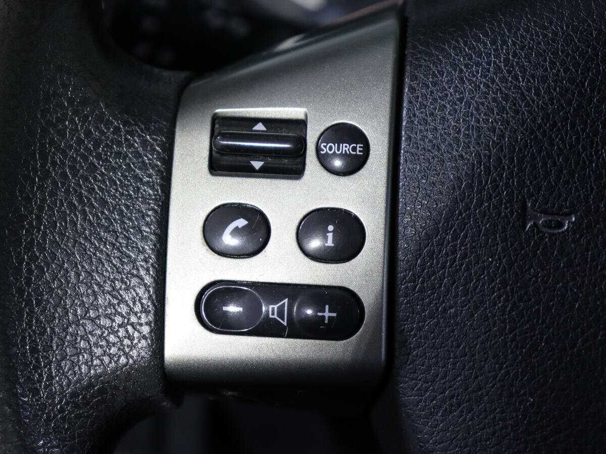 Nissan Tiida с пробегом — 2011 год. Фото: #13