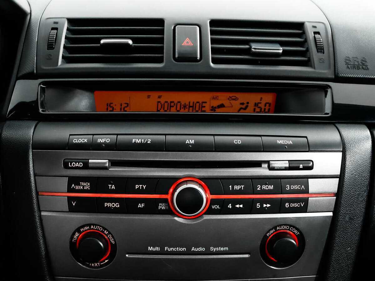 Mazda 3 с пробегом — 2007 год. Фото: #12