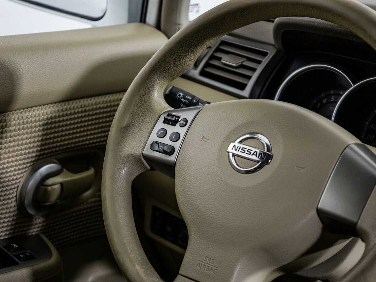 Nissan Tiida с пробегом — 2011 год. Фото: #13