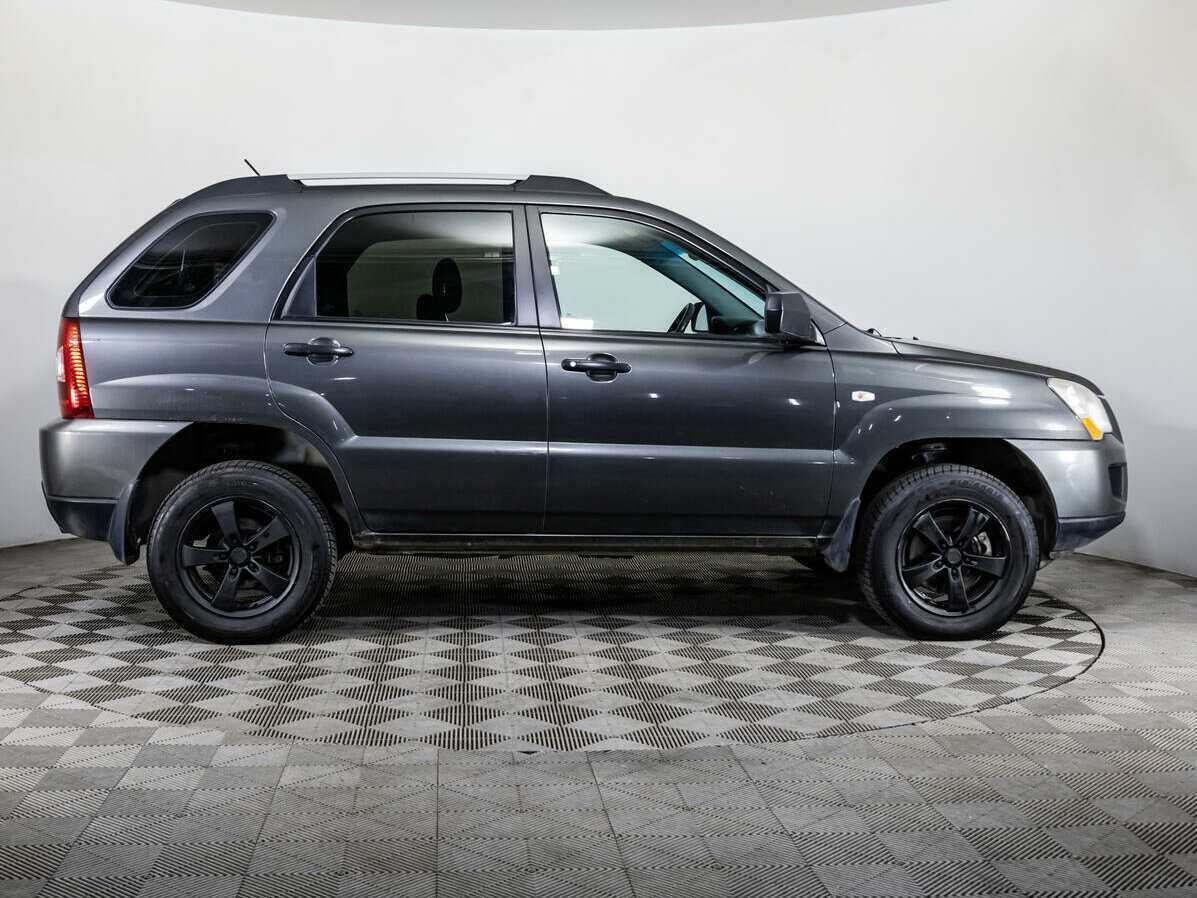 Kia Sportage с пробегом — 2009 год. Фото: #3