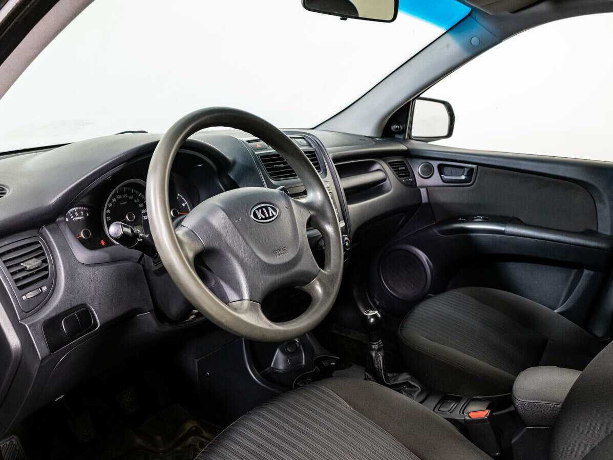 Kia Sportage с пробегом — 2009 год. Фото: #10
