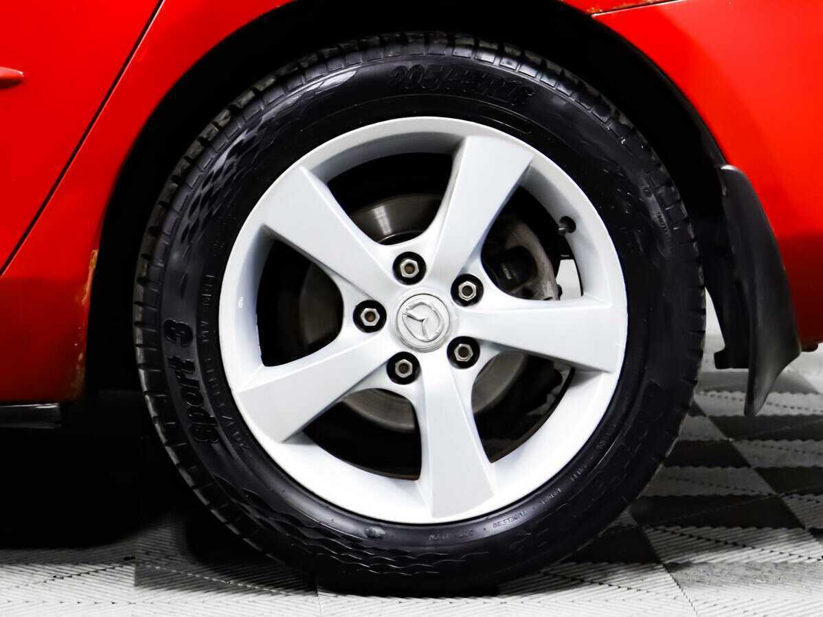 Mazda 3 с пробегом — 2005 год. Фото: #11