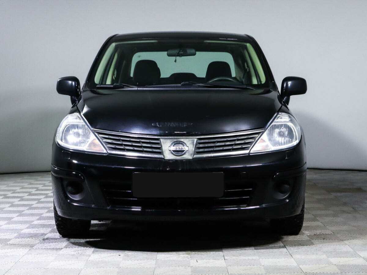 Nissan Tiida с пробегом — 2010 год. Фото: #1