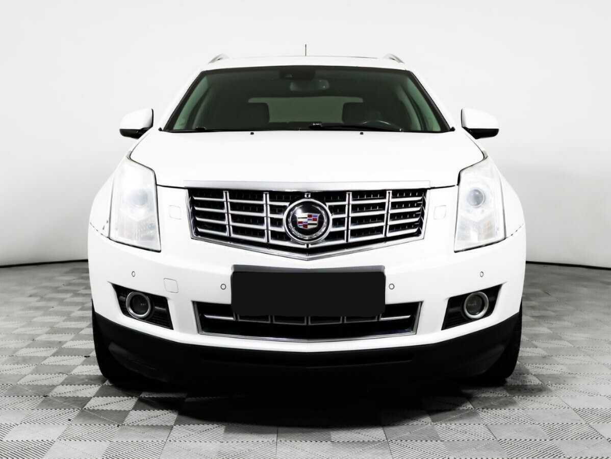 Cadillac SRX с пробегом — 2014 год. Фото: #1