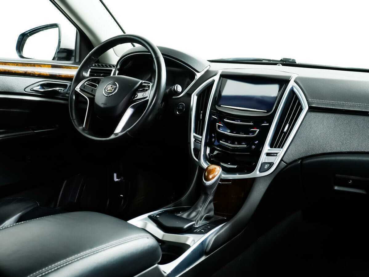Cadillac SRX с пробегом — 2014 год. Фото: #6