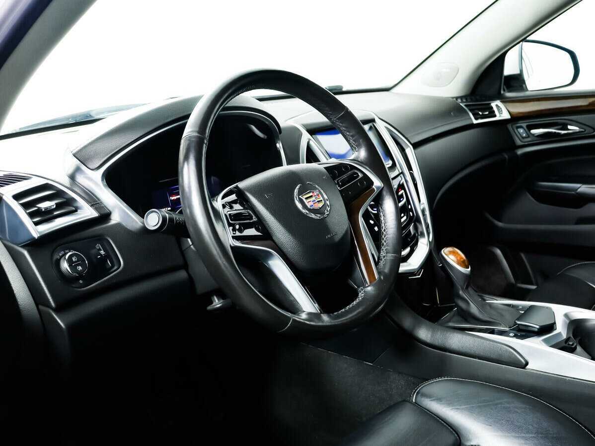 Cadillac SRX с пробегом — 2014 год. Фото: #10