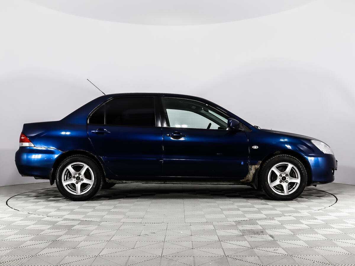Mitsubishi Lancer с пробегом — 2004 год. Фото: #3