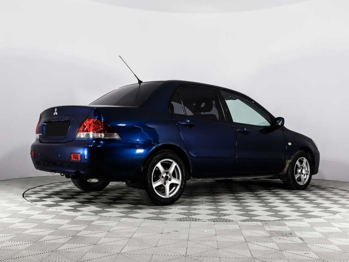 Mitsubishi Lancer с пробегом — 2004 год. Фото: #4