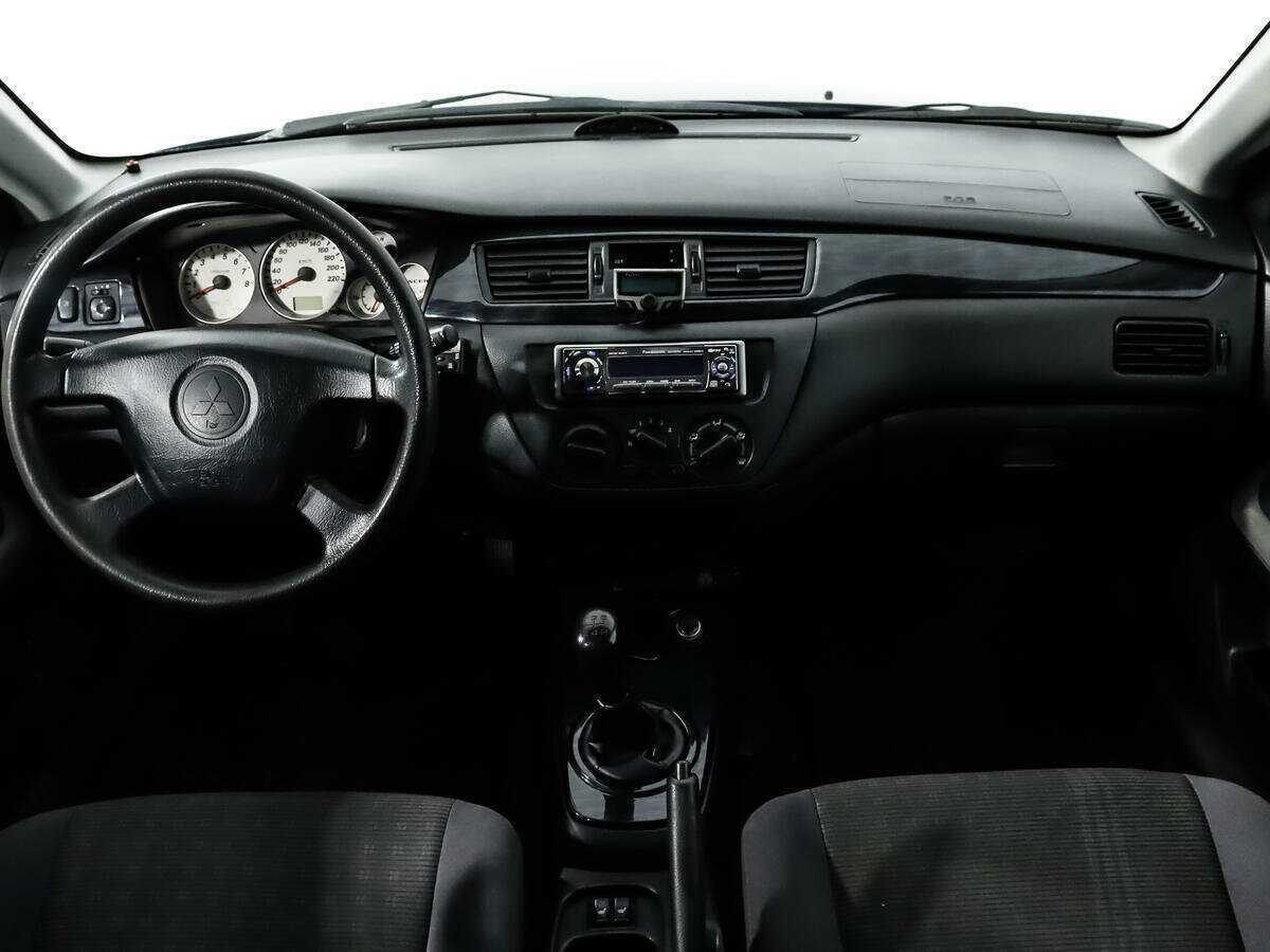Mitsubishi Lancer с пробегом — 2004 год. Фото: #11