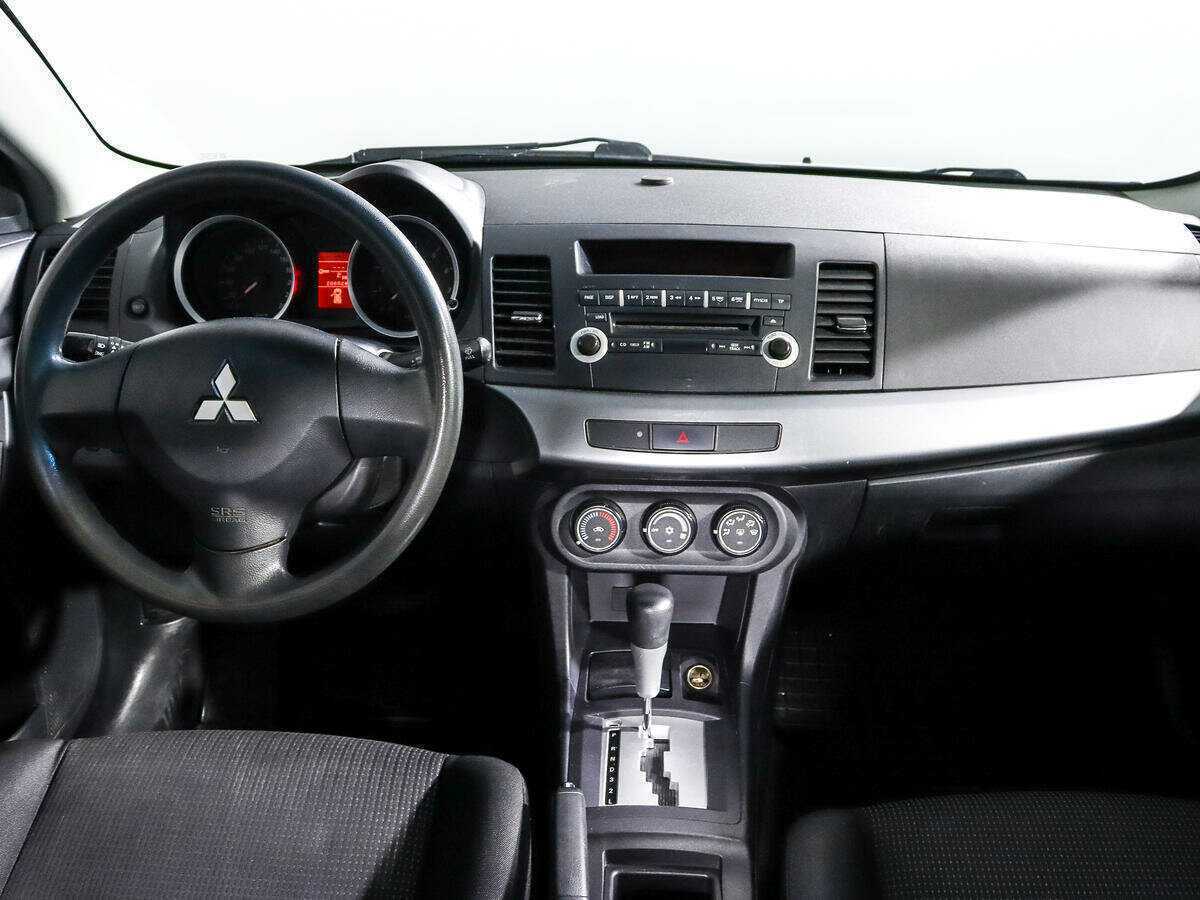 Mitsubishi Lancer с пробегом — 2010 год. Фото: #11