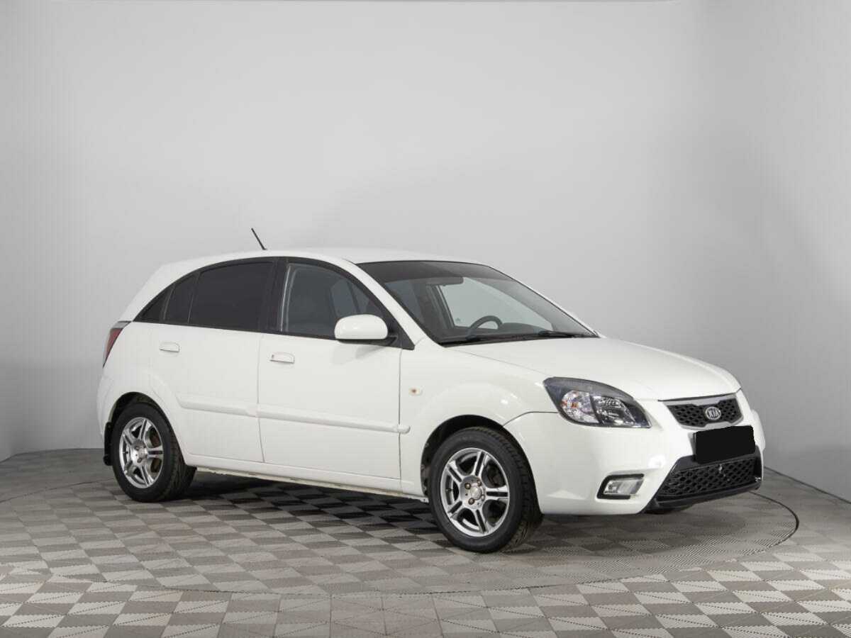 Kia Rio с пробегом — 2011 год. Фото: #2