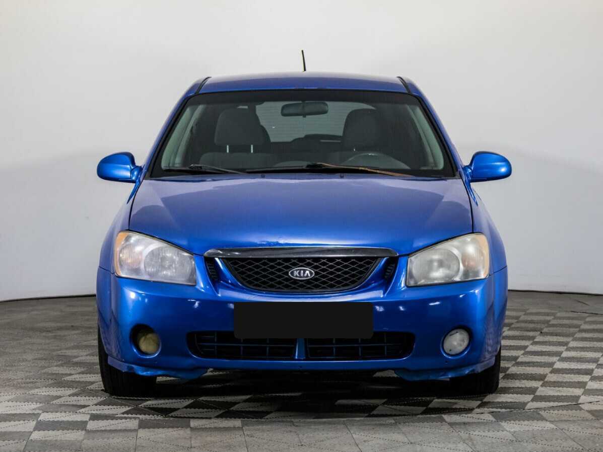 Kia Spectra с пробегом — 2004 год. Фото: #1