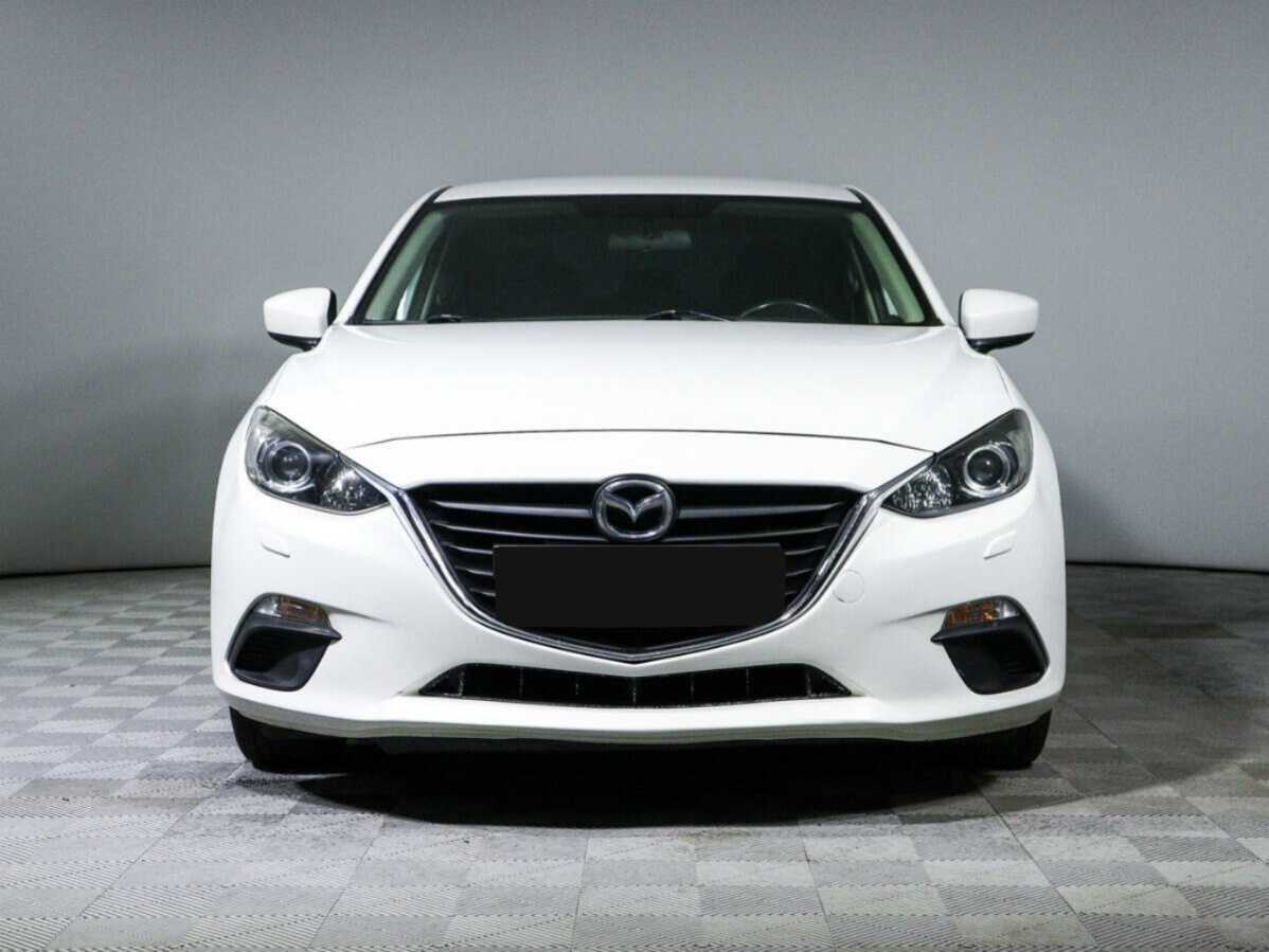 Mazda 3 с пробегом — 2014 год. Фото: #1