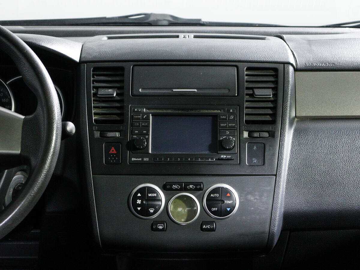 Nissan Tiida с пробегом — 2011 год. Фото: #12