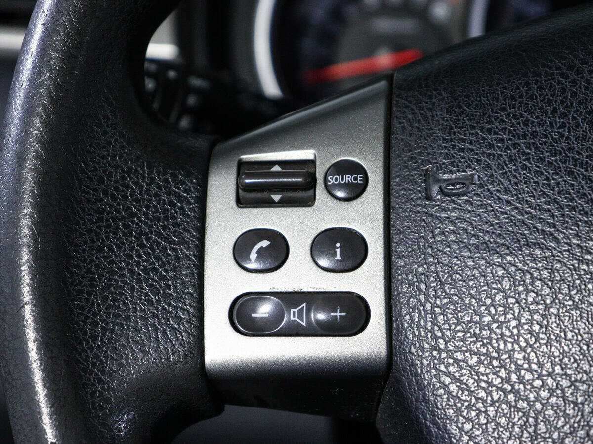 Nissan Tiida с пробегом — 2011 год. Фото: #16