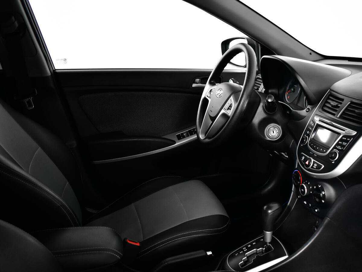 Hyundai Solaris с пробегом — 2013 год. Фото: #6