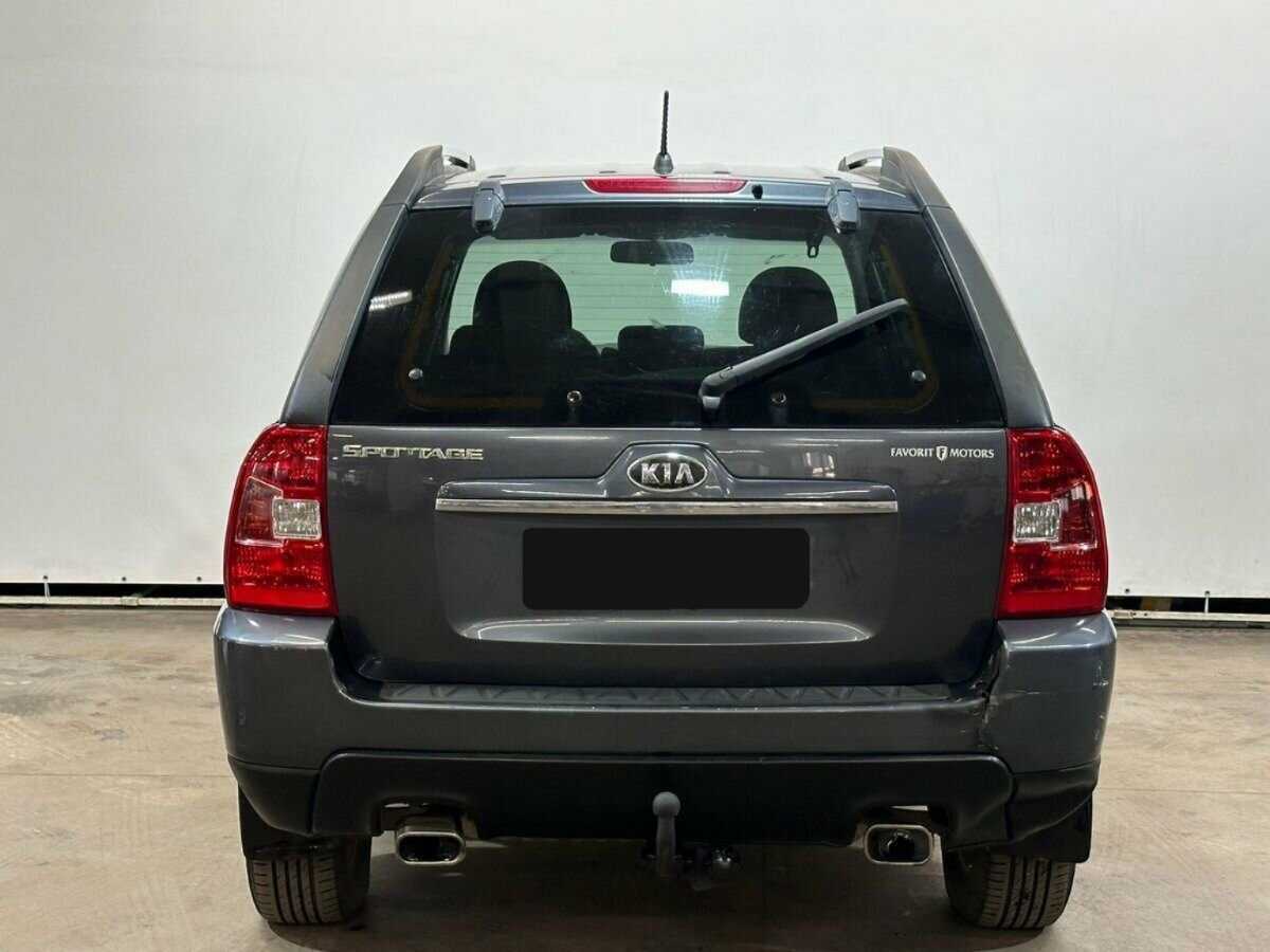 Kia Sportage с пробегом — 2010 год. Фото: #5