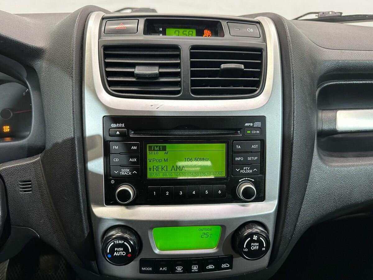 Kia Sportage с пробегом — 2010 год. Фото: #11