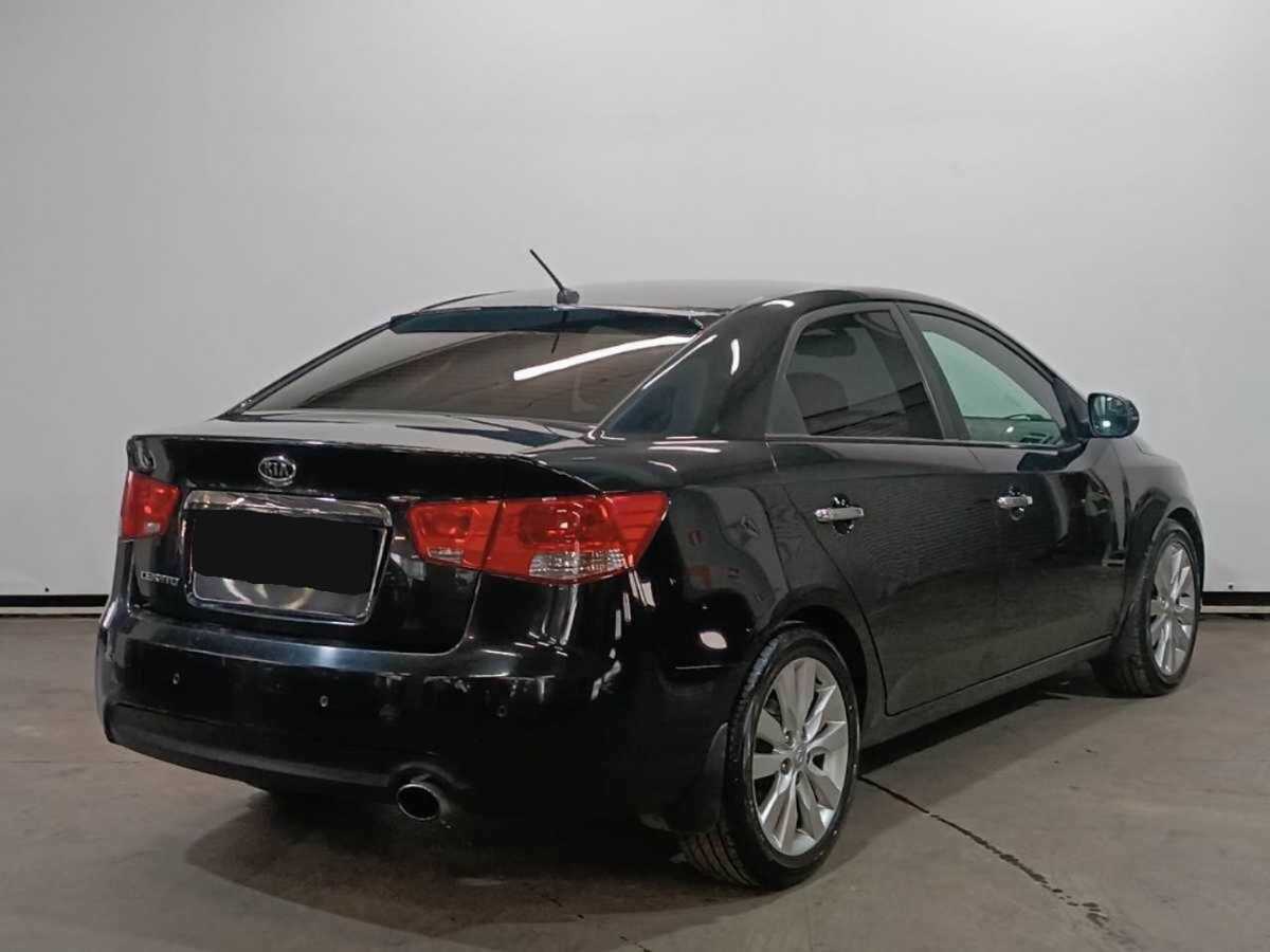 Kia Cerato с пробегом — 2011 год. Фото: #4