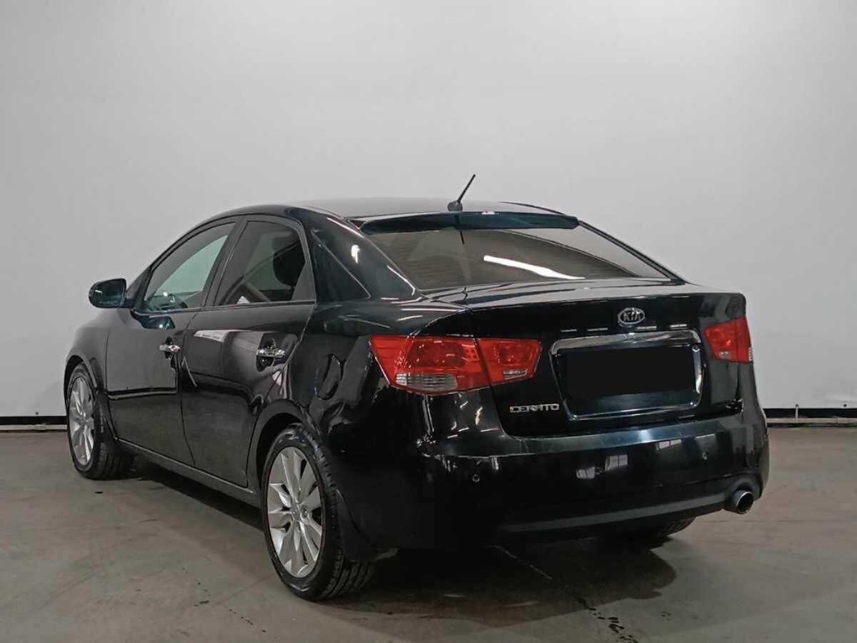 Kia Cerato с пробегом — 2011 год. Фото: #6