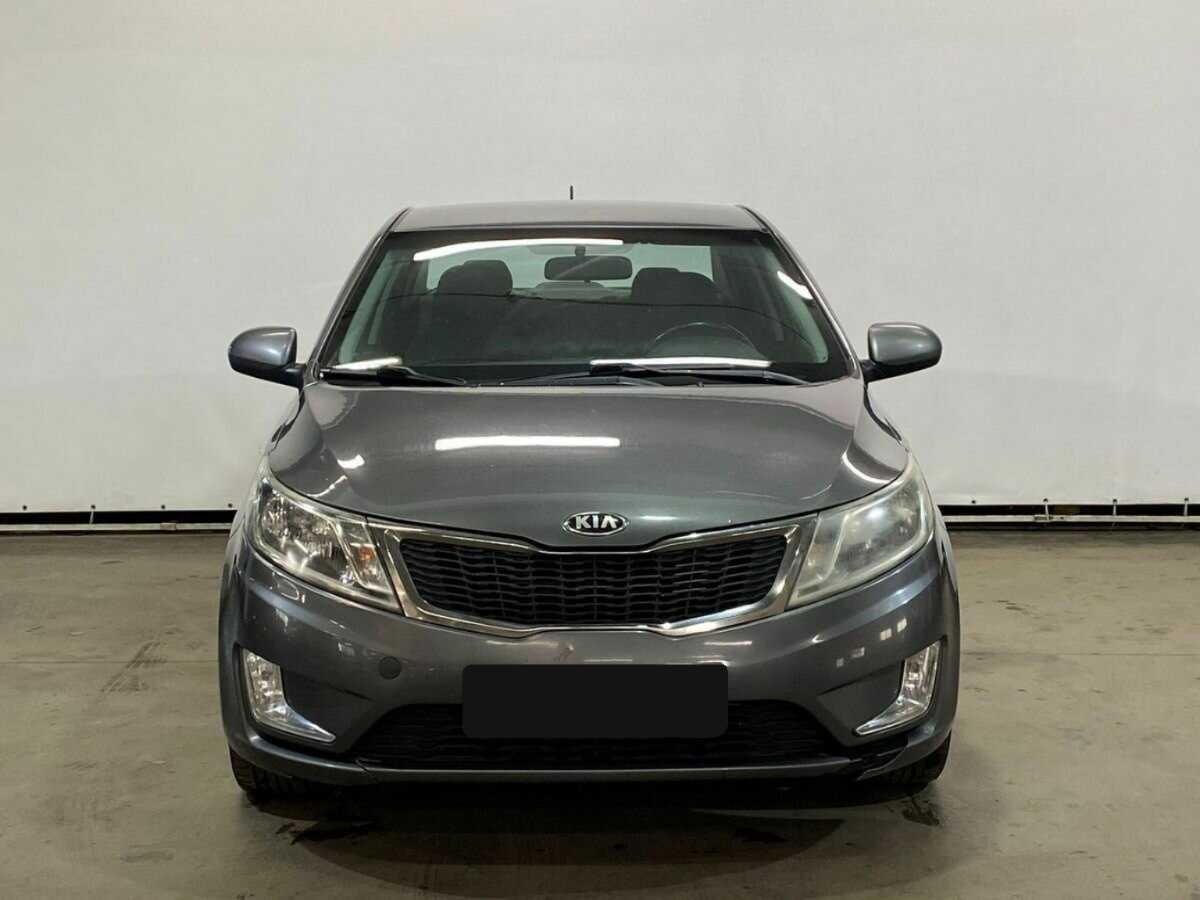 Kia Rio с пробегом — 2014 год. Фото: #1