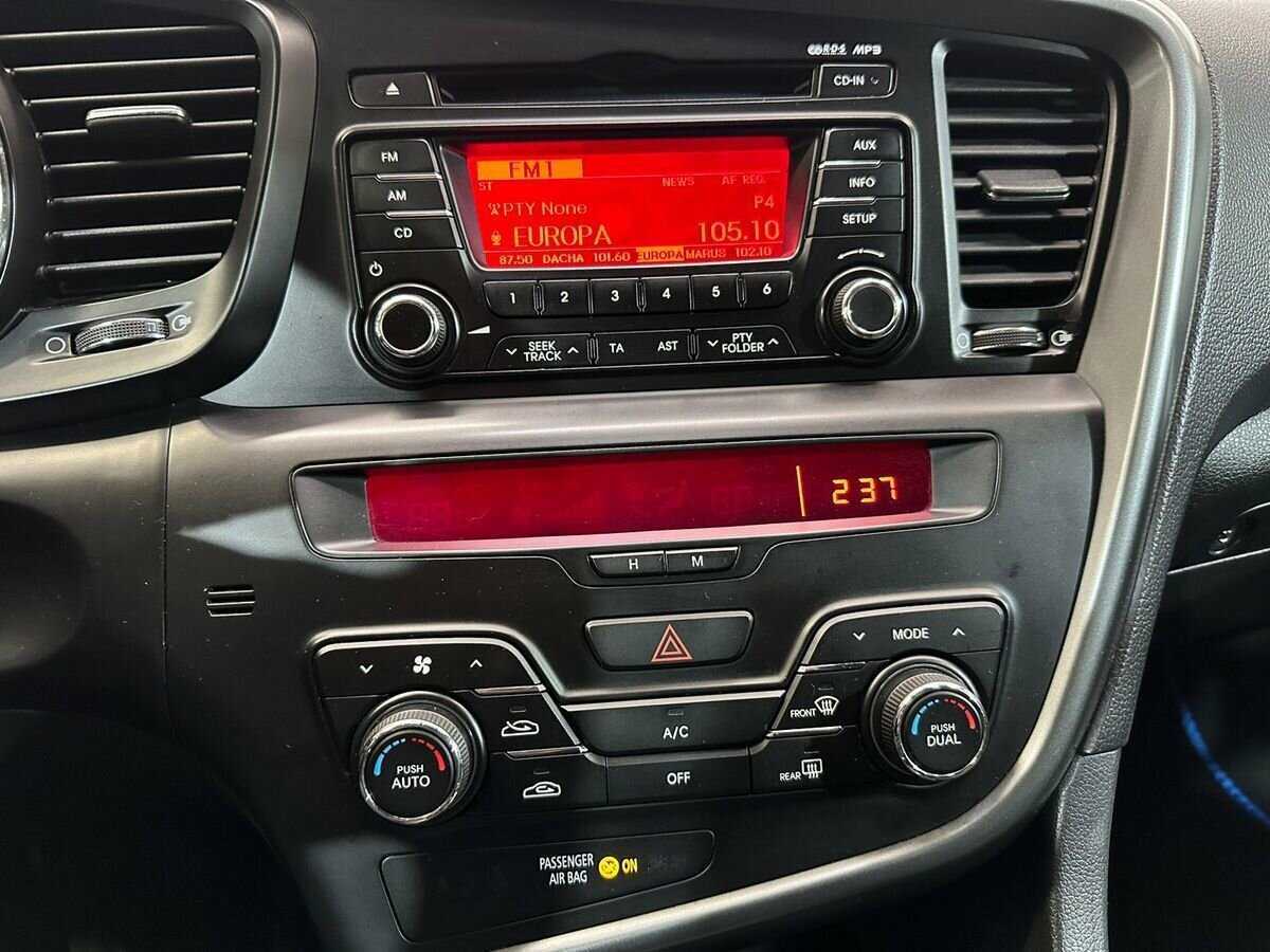 Kia Optima с пробегом — 2011 год. Фото: #12