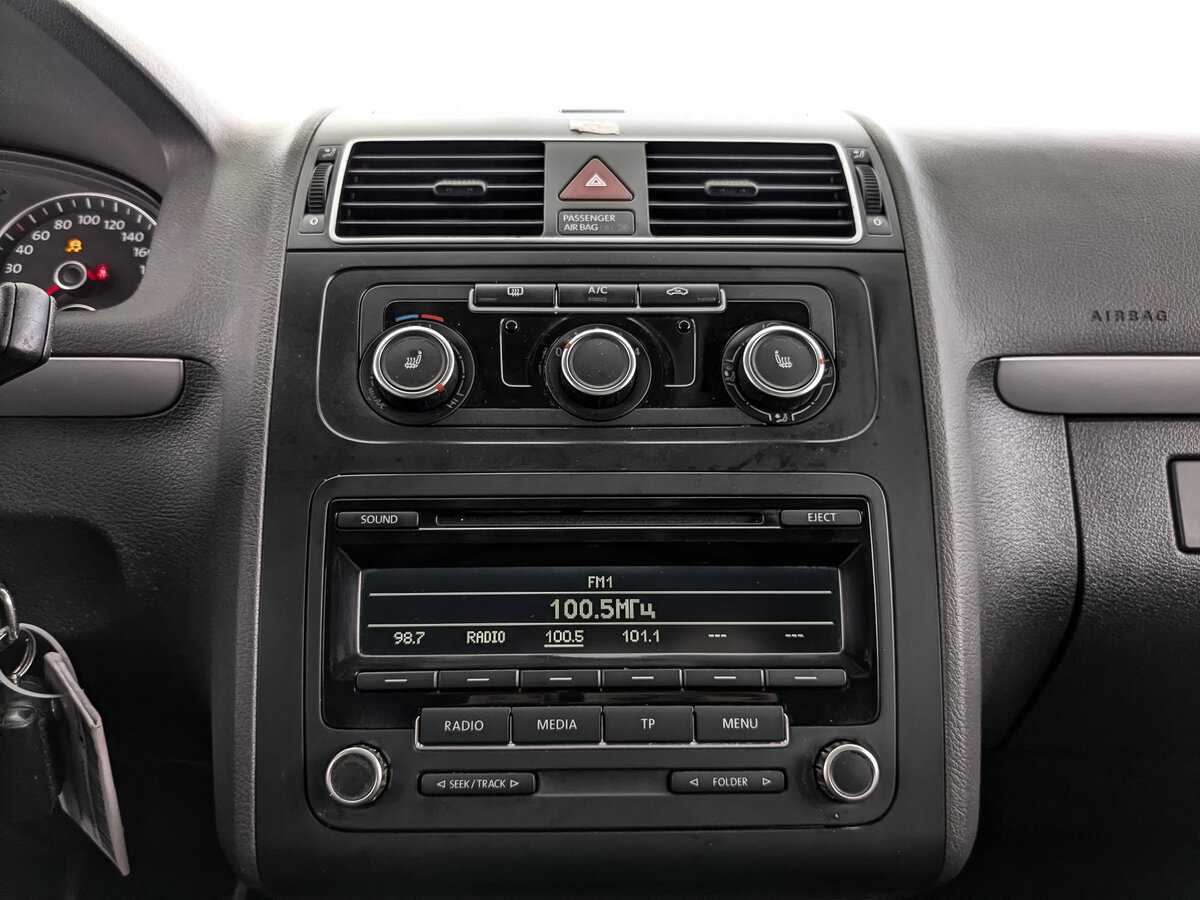 Volkswagen Touran с пробегом — 2012 год. Фото: #12