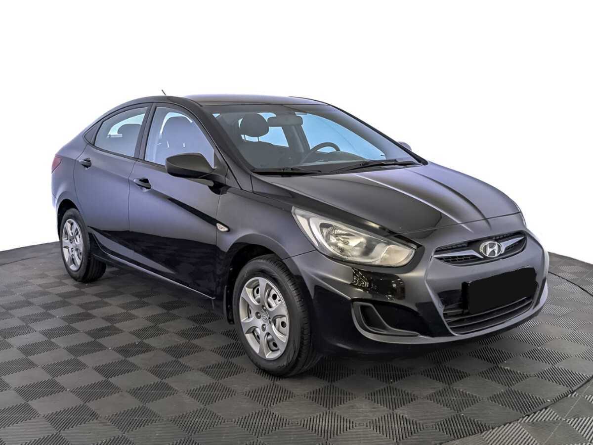 Hyundai Solaris с пробегом — 2013 год. Фото: #2