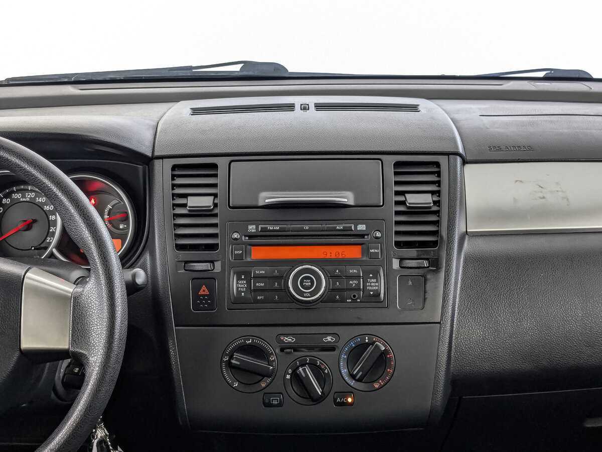 Nissan Tiida с пробегом — 2011 год. Фото: #12