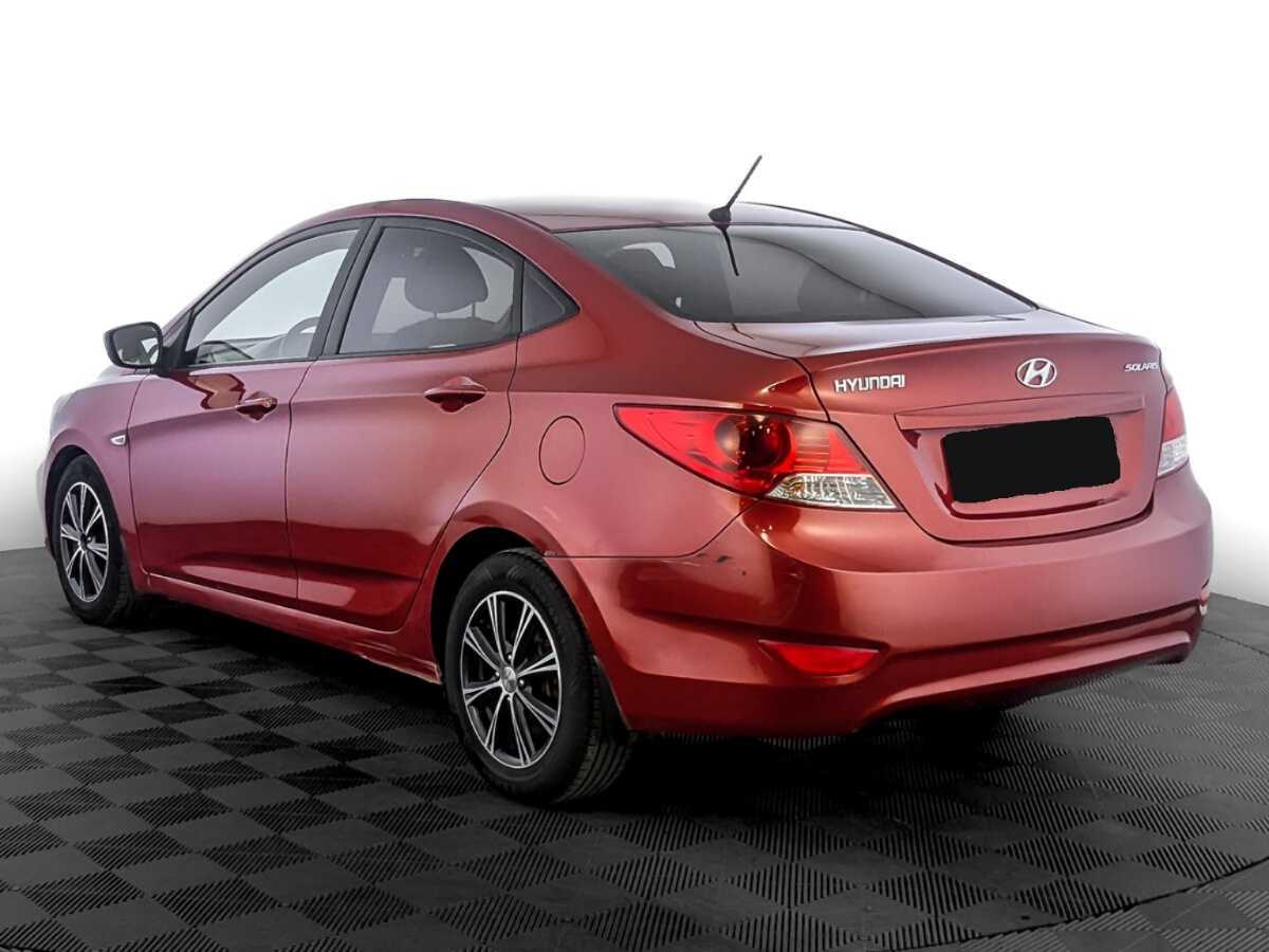 Hyundai Solaris с пробегом — 2012 год. Фото: #6