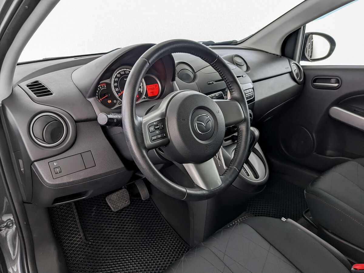Mazda 2 с пробегом — 2013 год. Фото: #13