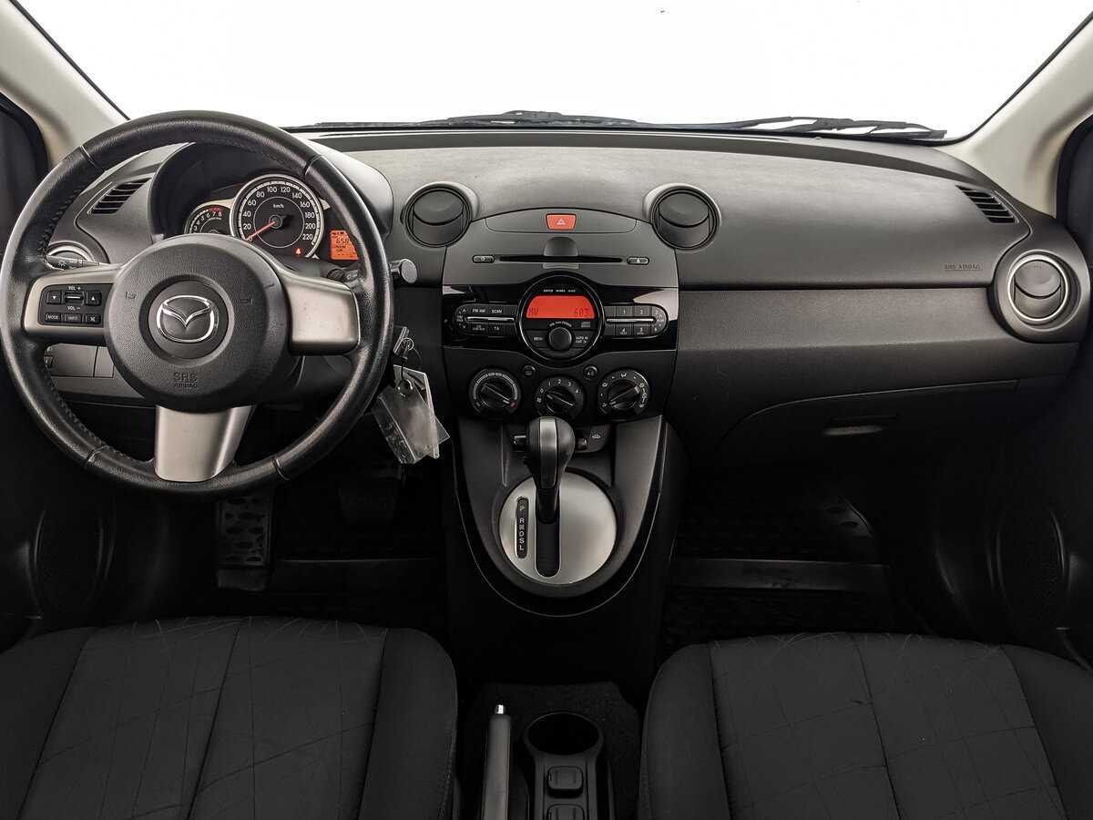 Mazda 2 с пробегом — 2013 год. Фото: #11