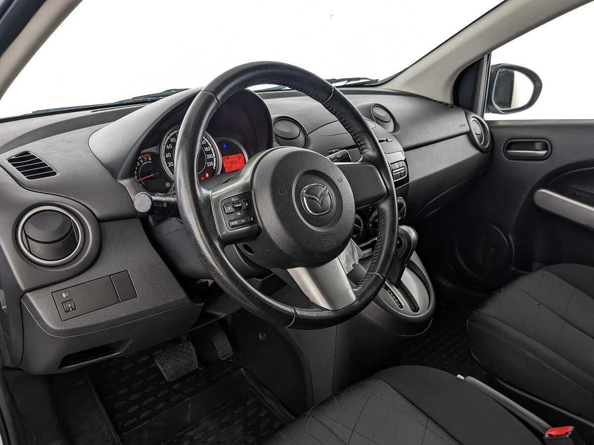 Mazda 2 с пробегом — 2013 год. Фото: #13