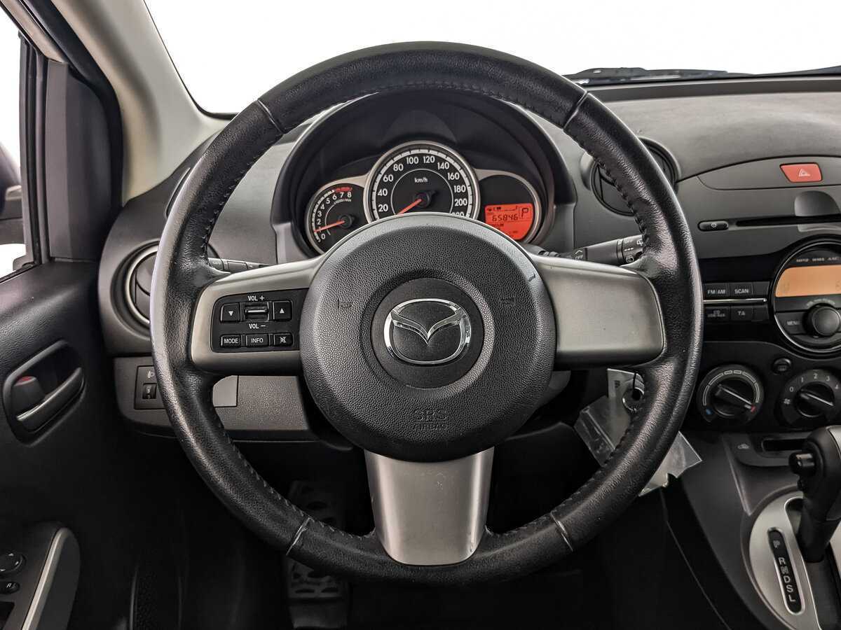 Mazda 2 с пробегом — 2013 год. Фото: #16